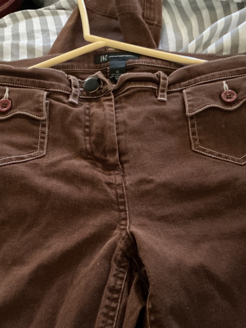 Inc vintage 1990 jeans with slight boot flare brown with pockets.